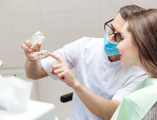 Dentist discussing dental crowns in Phoenix