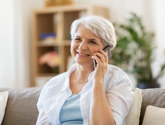 Woman calling dental office to schedule an appointment