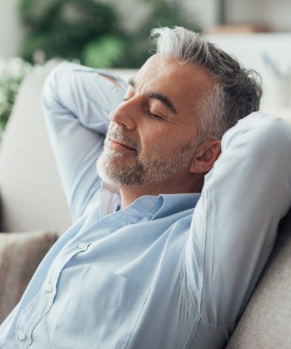 Man relaxing after sedation dentistry visit